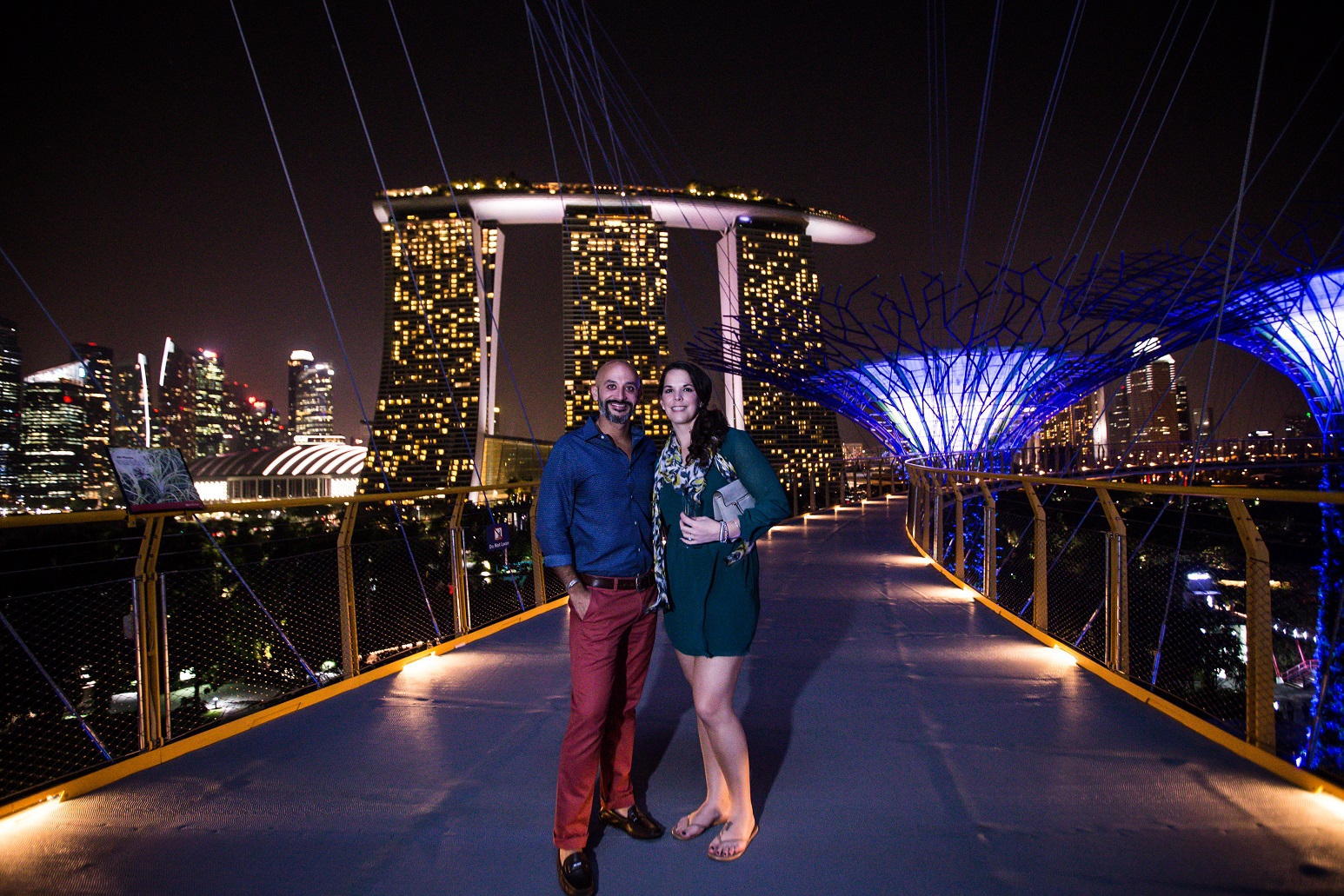 a couple posing along the OCBC Skyway at Gardens by the Bay